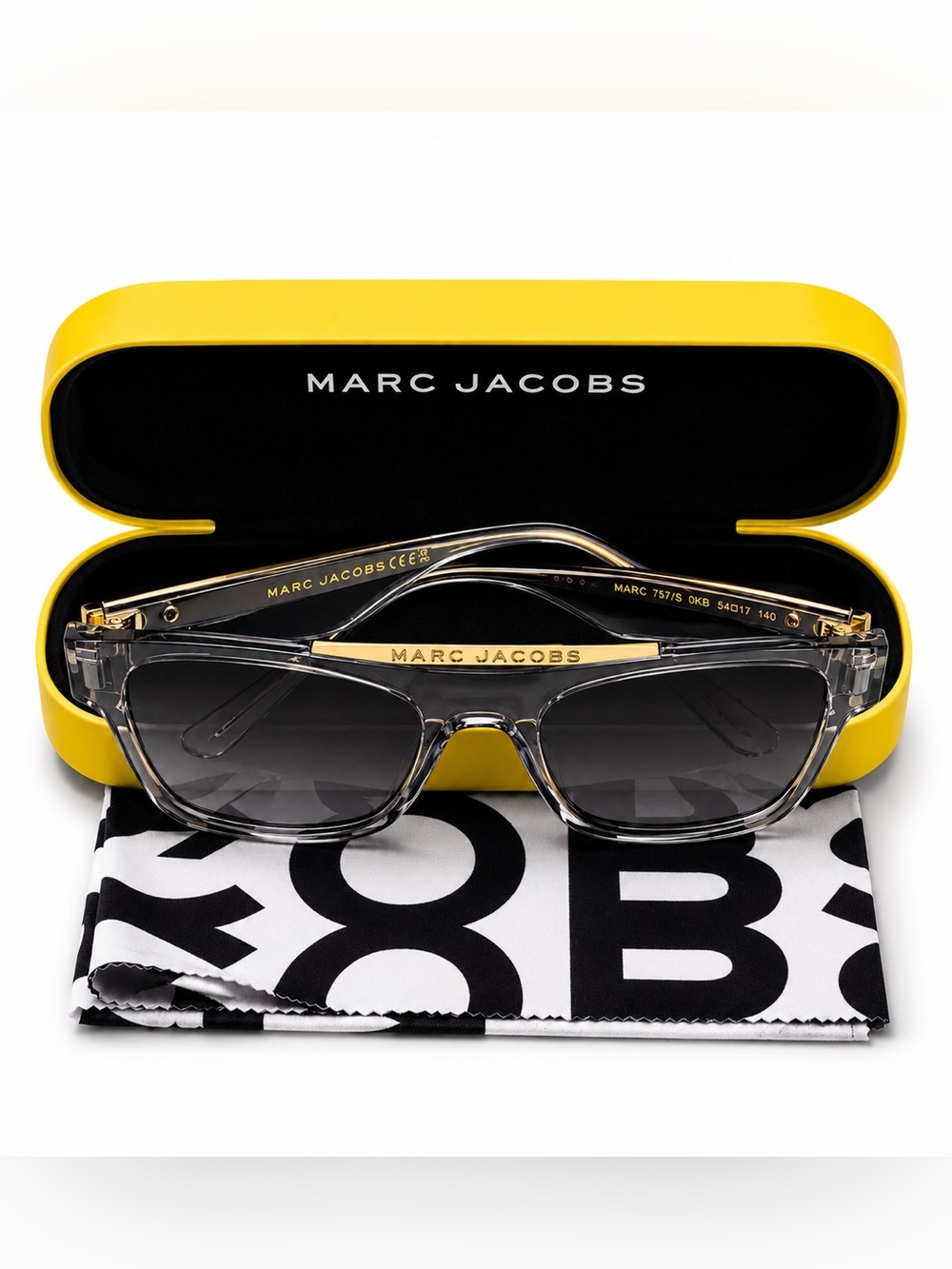NWOT Marc Jacobs Transparent Frame Sunglasses with Gold Logo and Gray Lenses